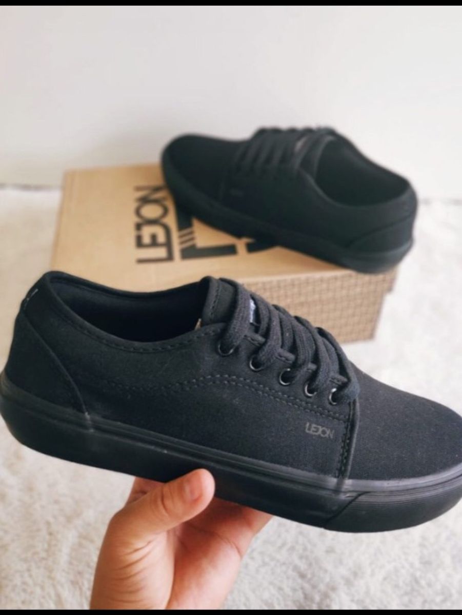 tenis lejon preto