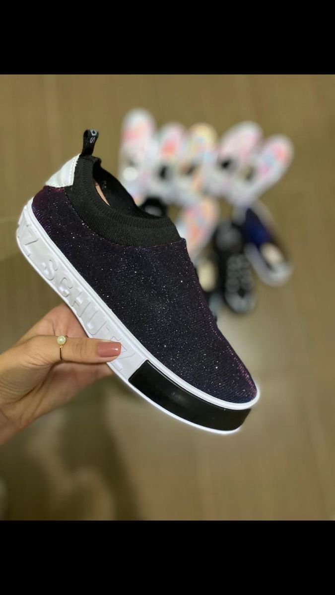 tenis holografico schutz