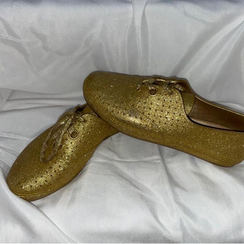 Tenis melissa hot sale dourado glitter