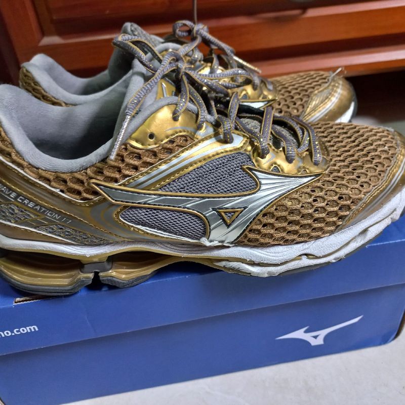 Mizuno creation shop gold feminino