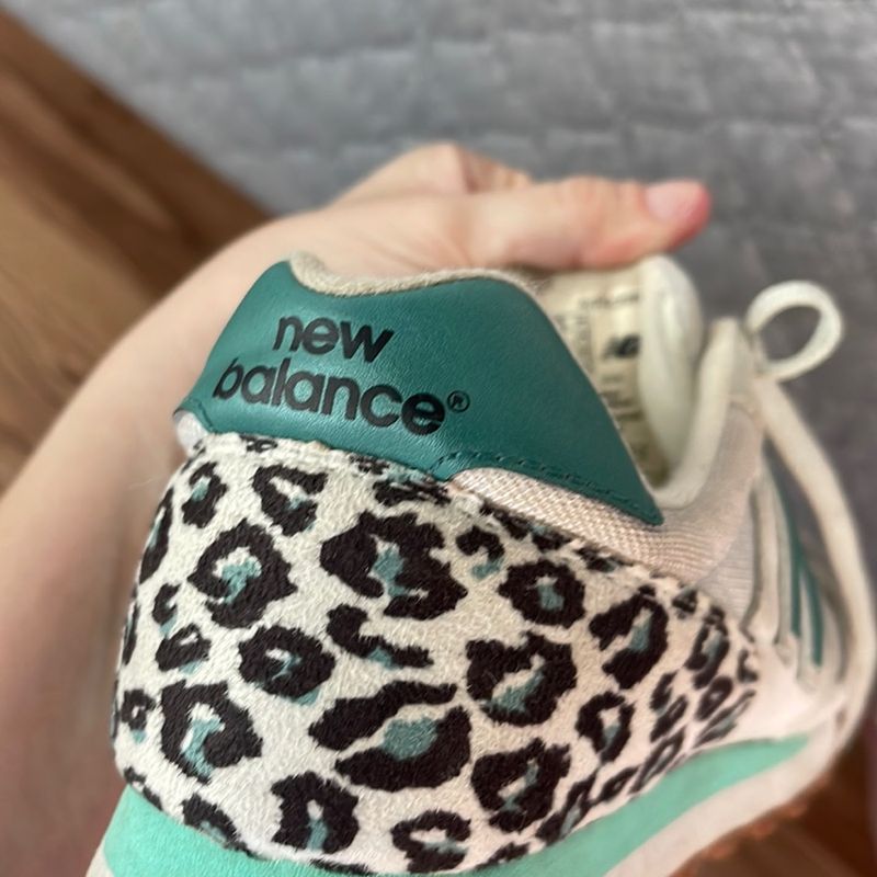 Tenis new clearance balance feminiño oncinha