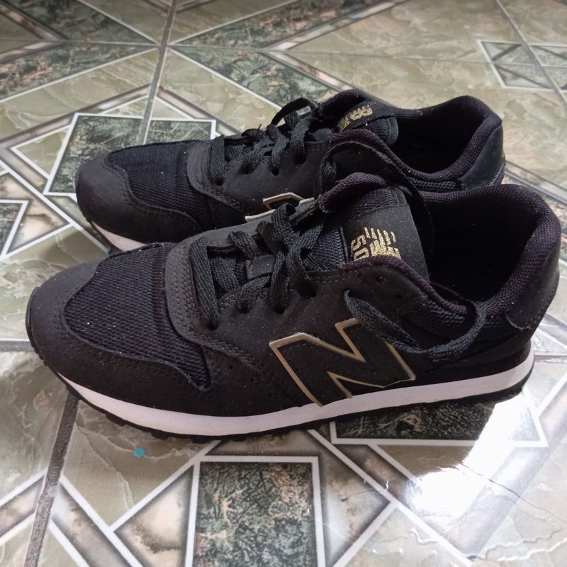 New balance best sale preto com dourado