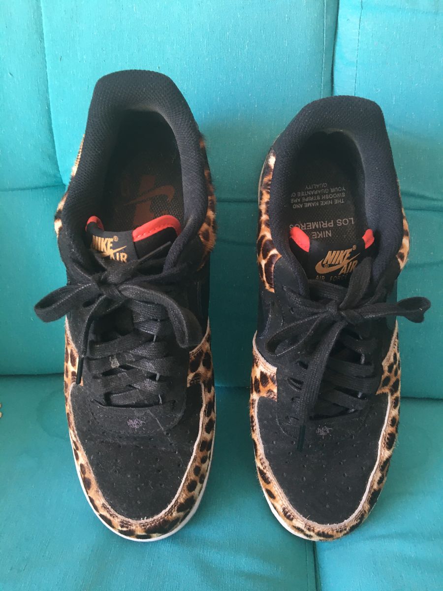 tenis nike onça