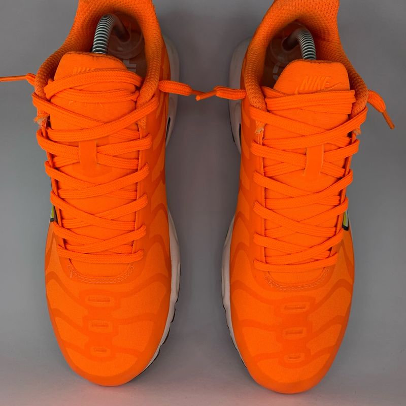 Tenis best sale laranja nike