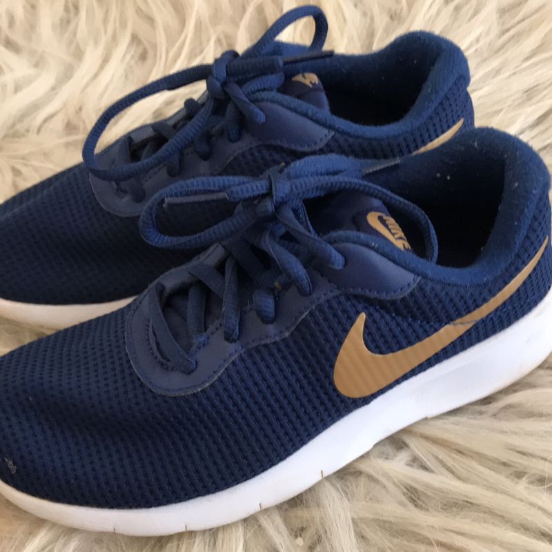 Nike azul best sale e dourado