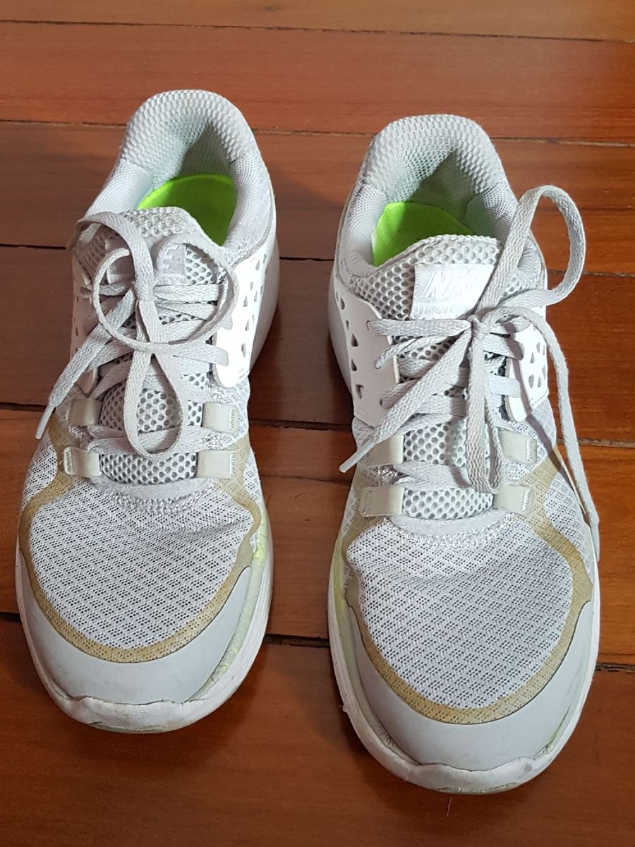 bota longa com calça jeans