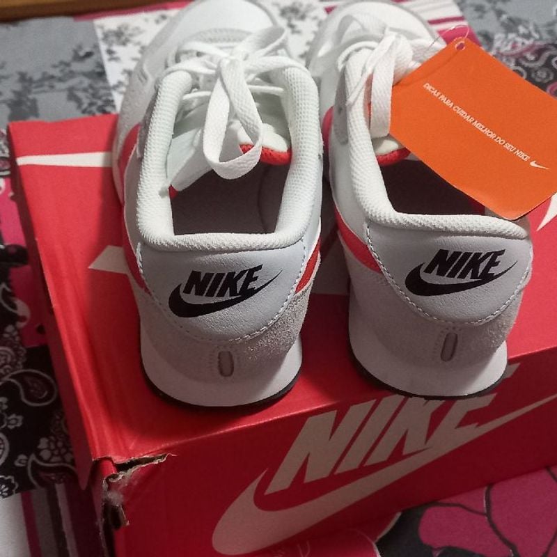 Tenis nike best sale branco novo