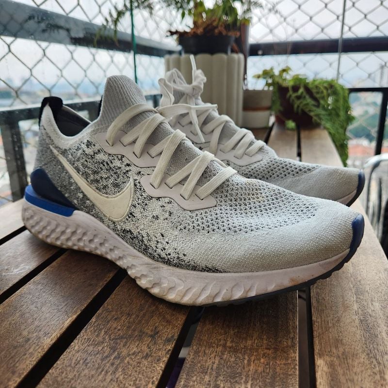 Tênis nike epic react flyknit hot sale masculino branco