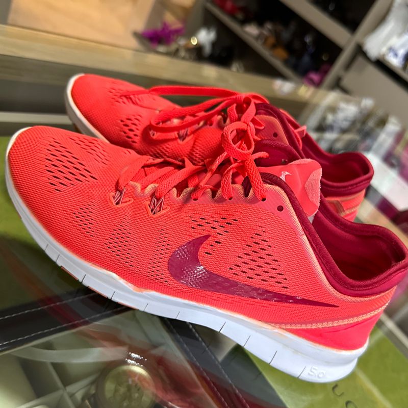 Tenis nike laranja store feminino