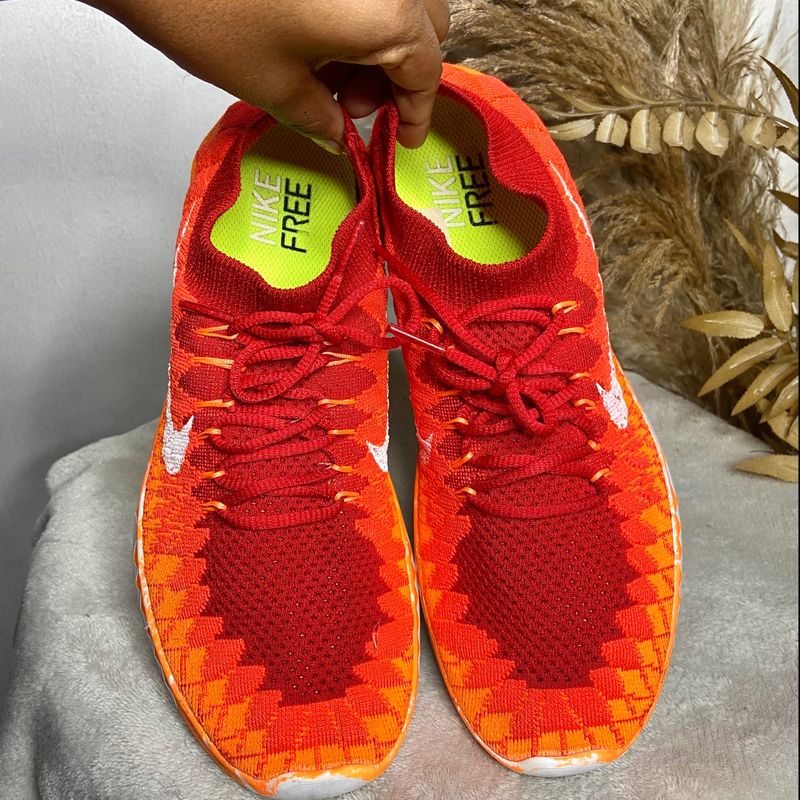 Nike free flyknit store orange