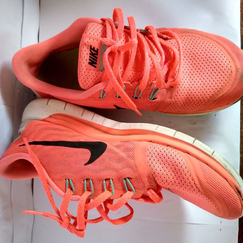 Tenis nike hot sale feminino fluorescente