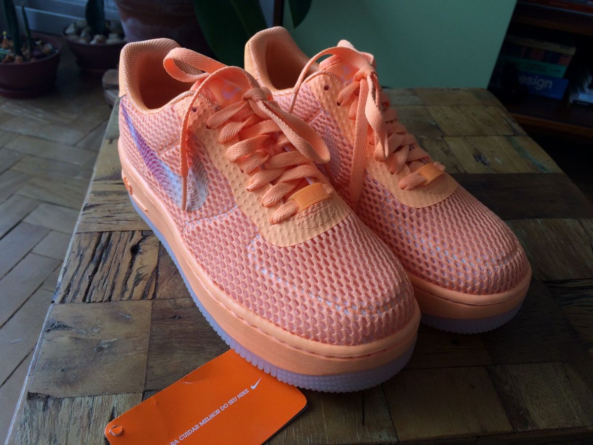 tenis nike laranja fluorescente