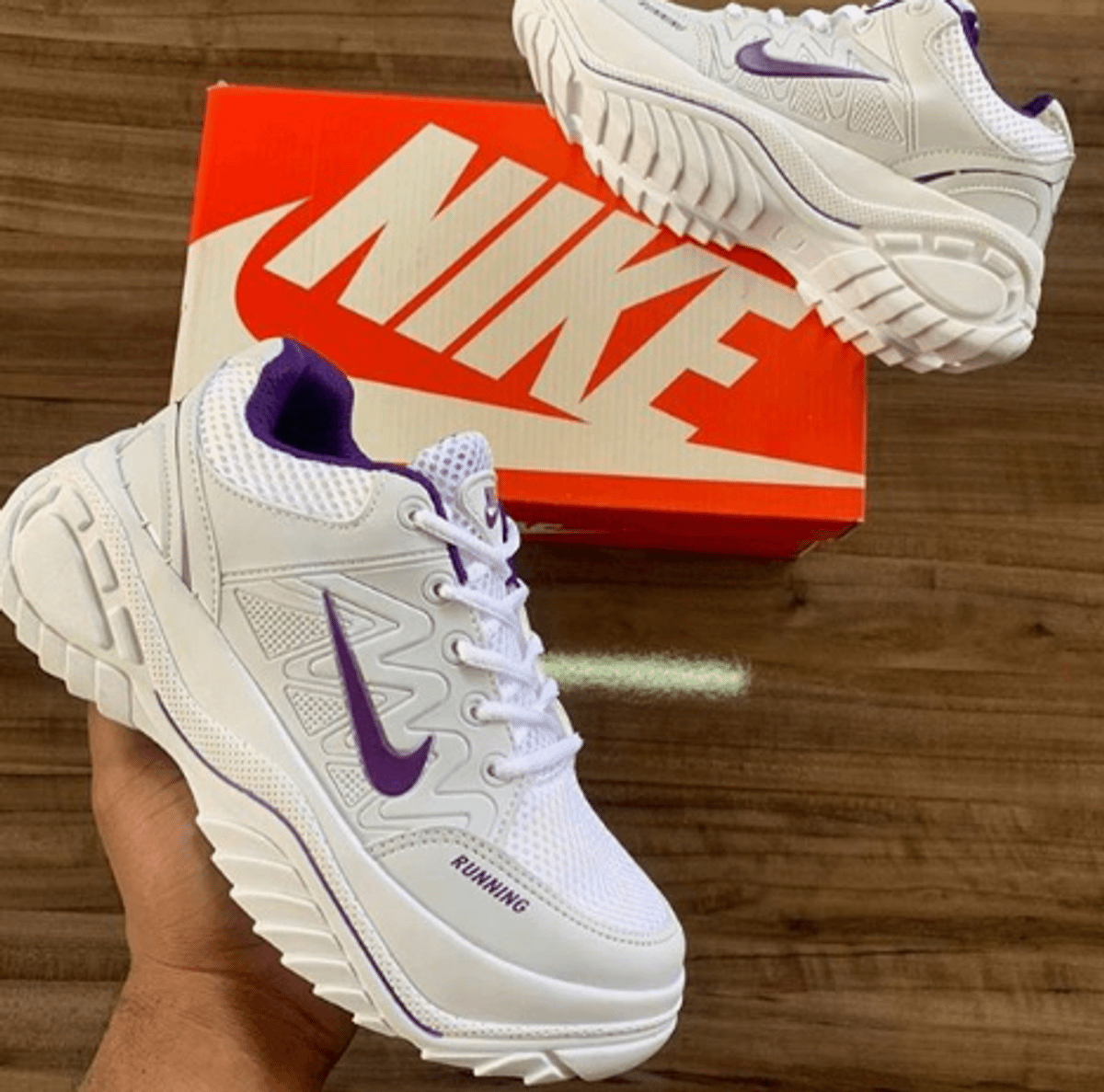 tenis nike running feminino roxo