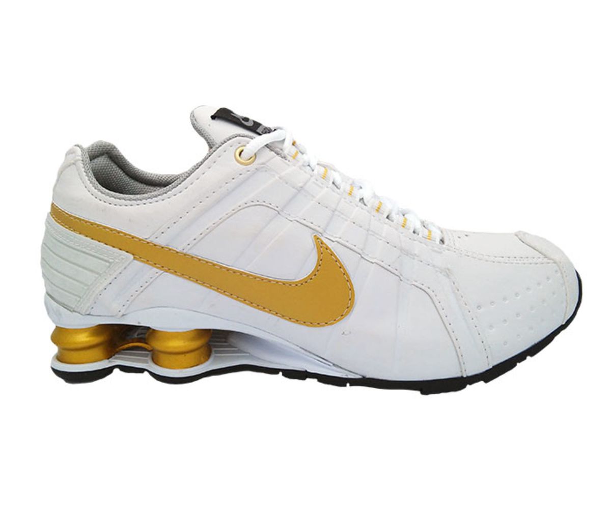 nike branco e dourado