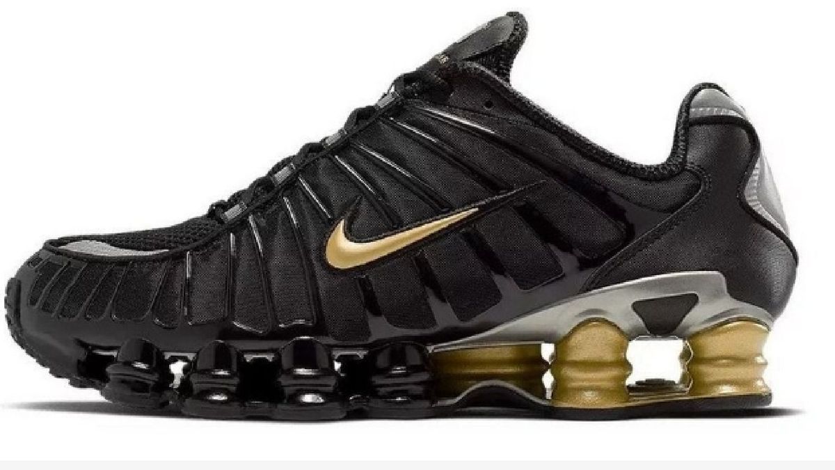 nike shox masculino preto e dourado