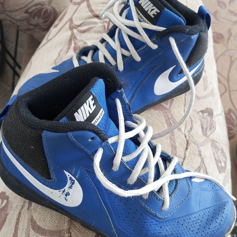 Tenis nike team hustle 2024 d7