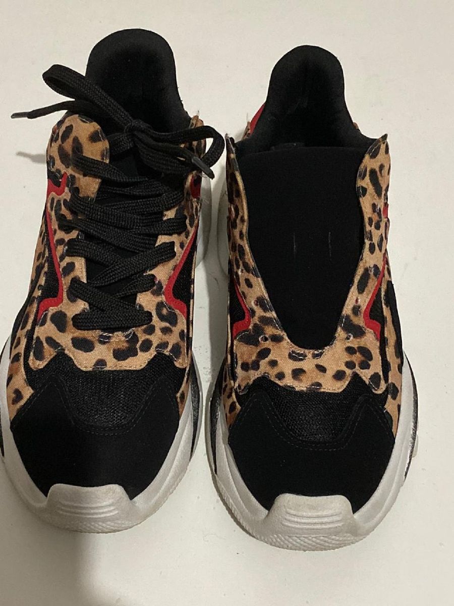 tenis onça constance