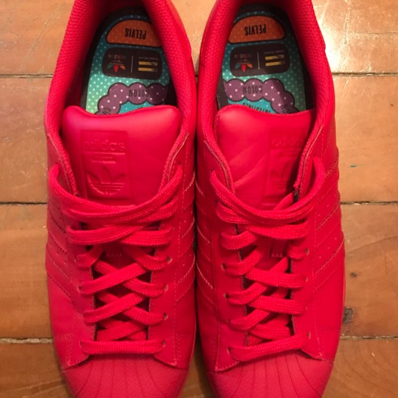 Pharrell williams deals adidas vermelho