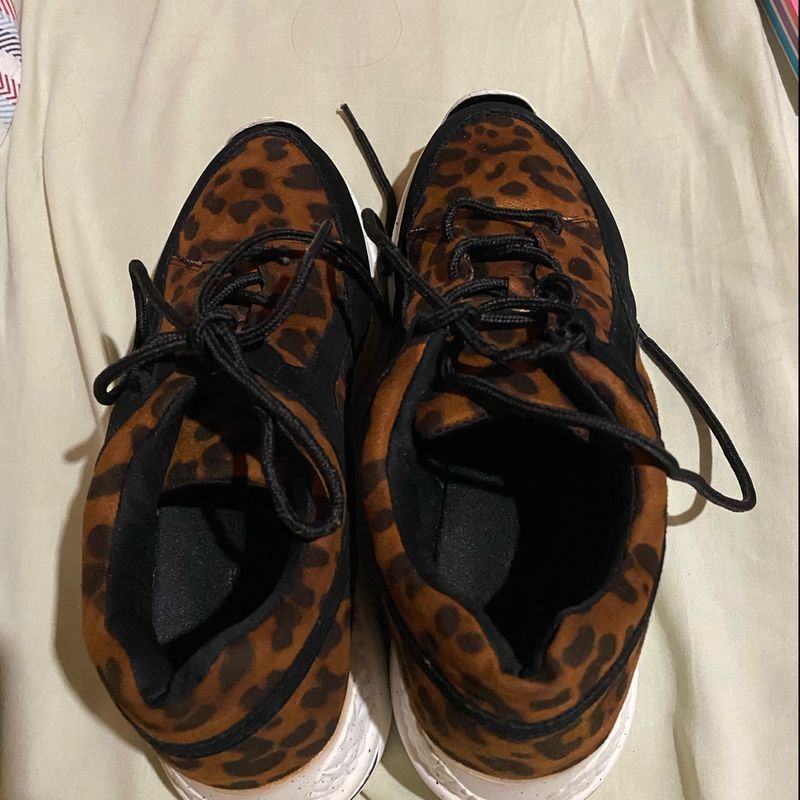 Tenis animal 2024 print riachuelo