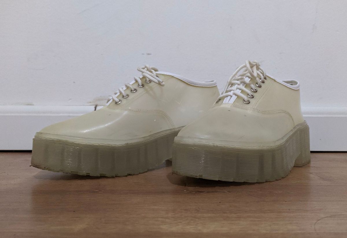 tenis plataforma transparente