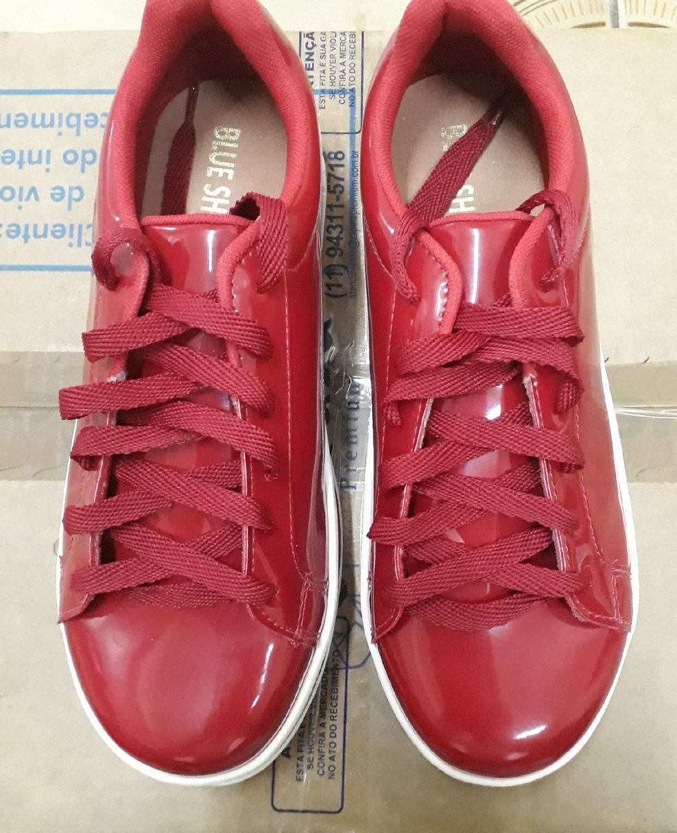 tenis vermelho plataforma