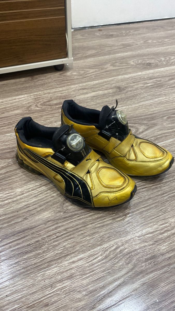 Puma disc preto e dourado best sale