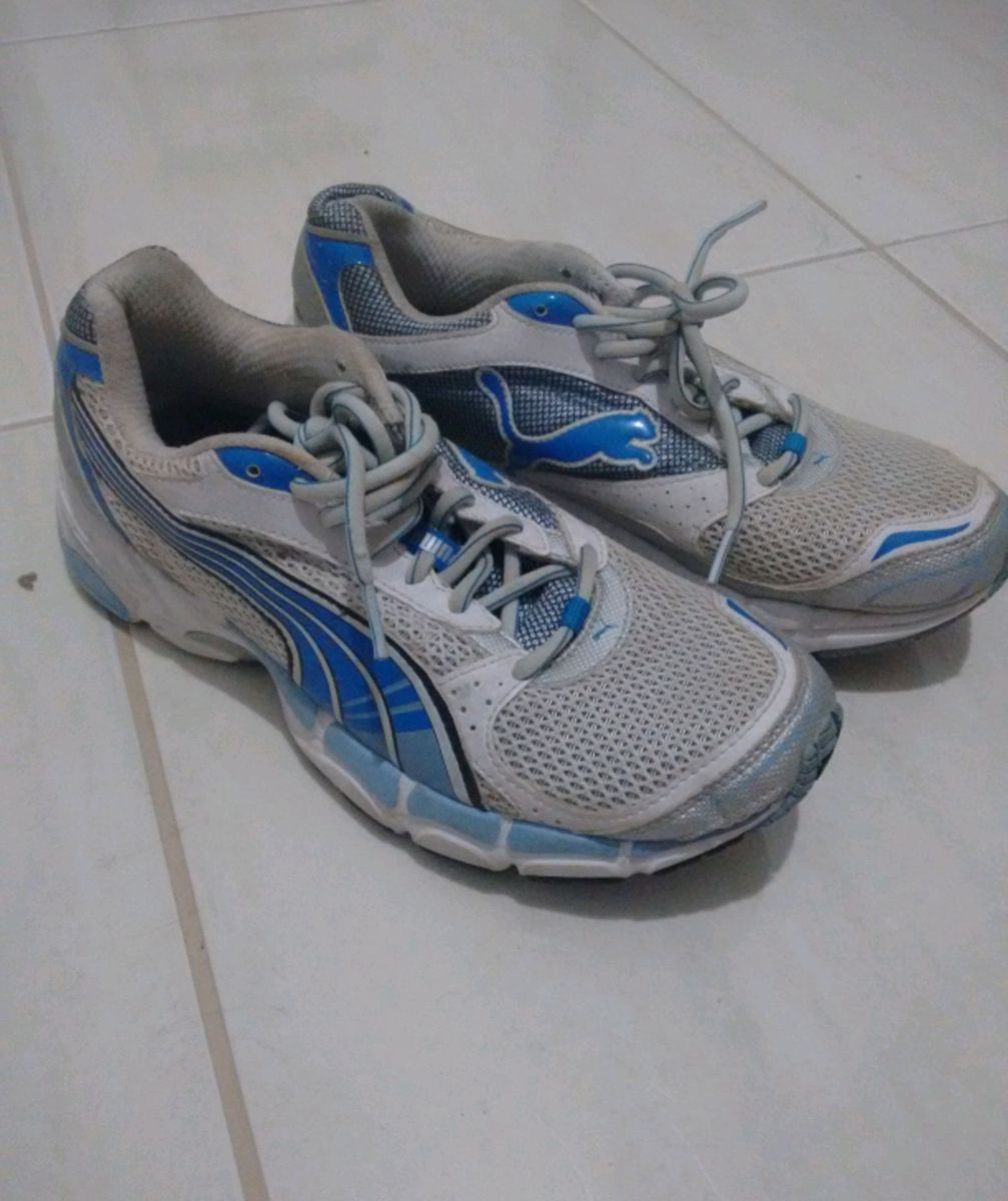 tenis puma tem forma grande