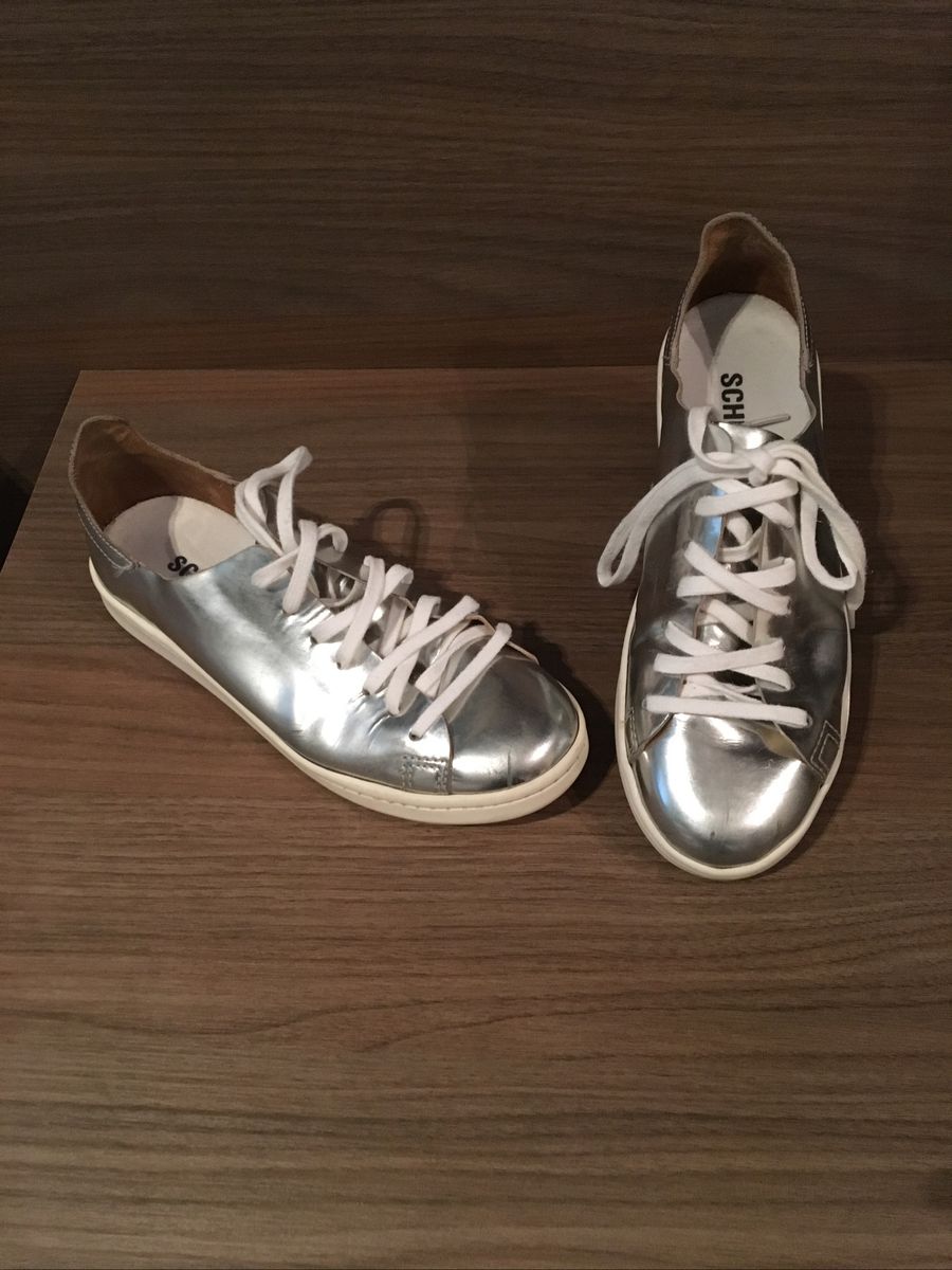 tenis schutz metalizado