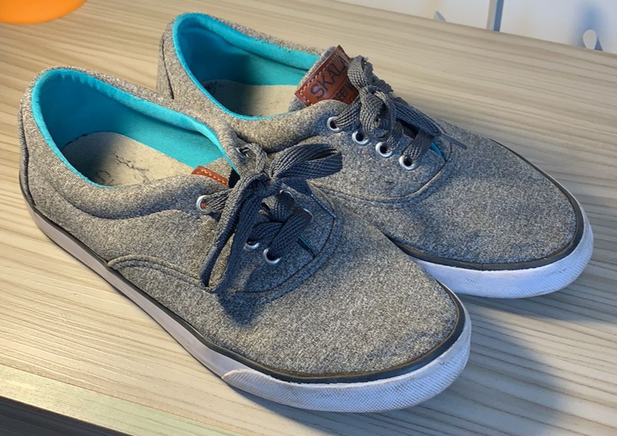 skala sapatos
