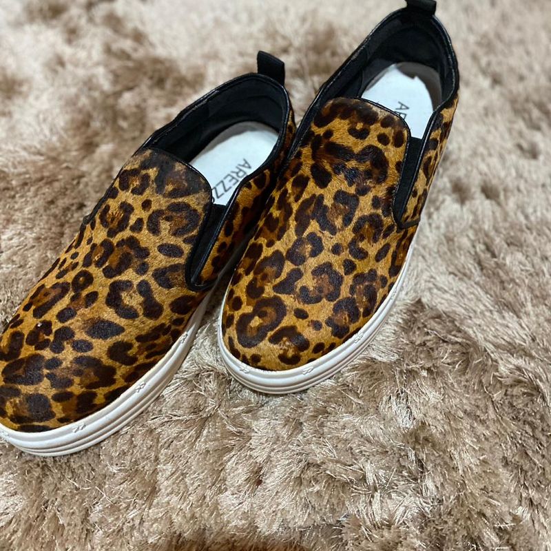 Slip on best sale arezzo animal print