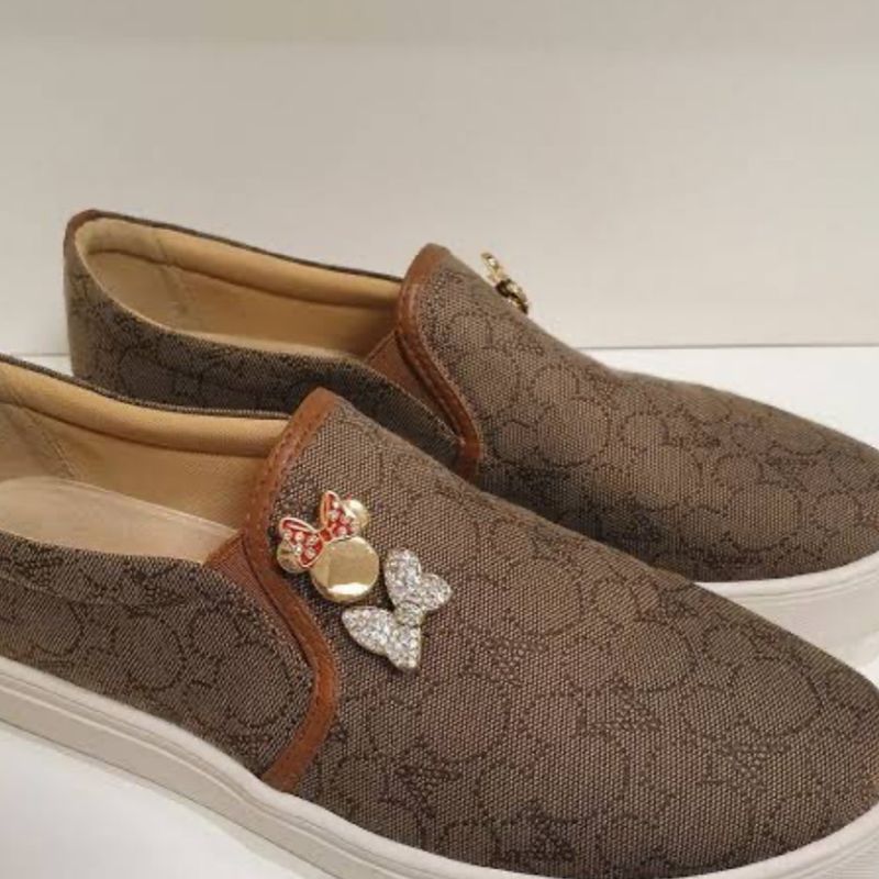 Slip on best sale arezzo disney