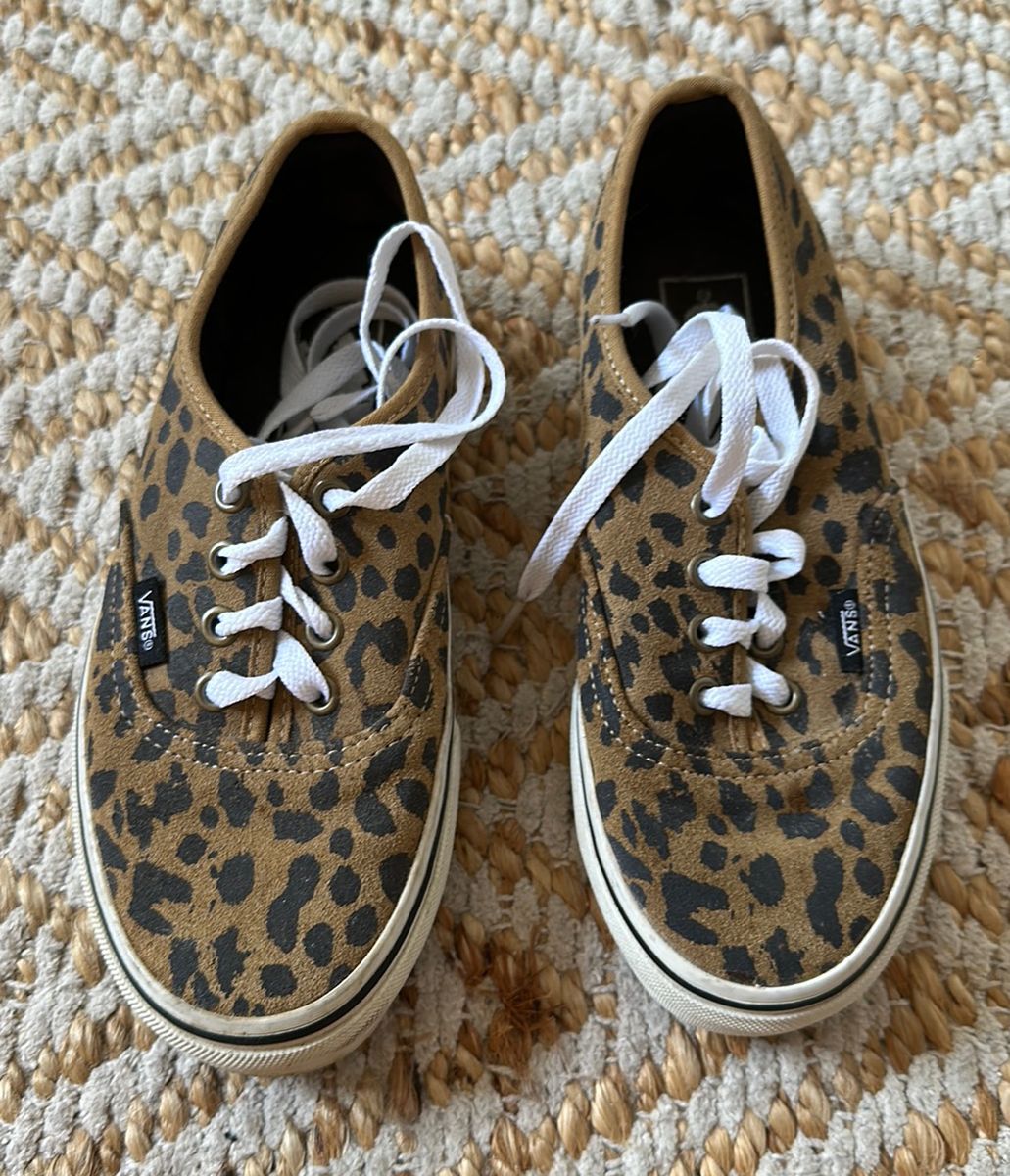 Vans de onça sales feminino