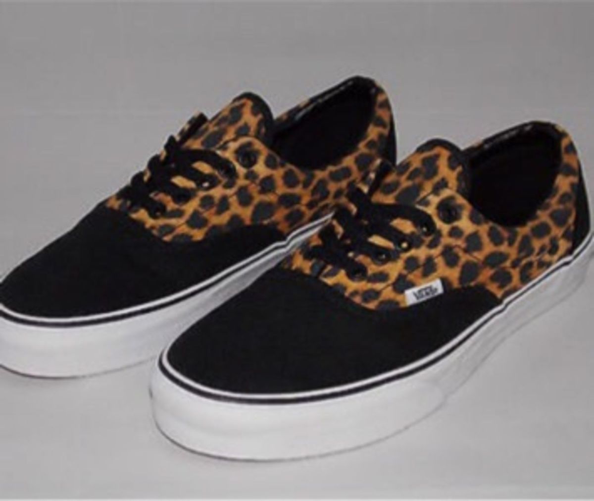 vans oncinha feminino