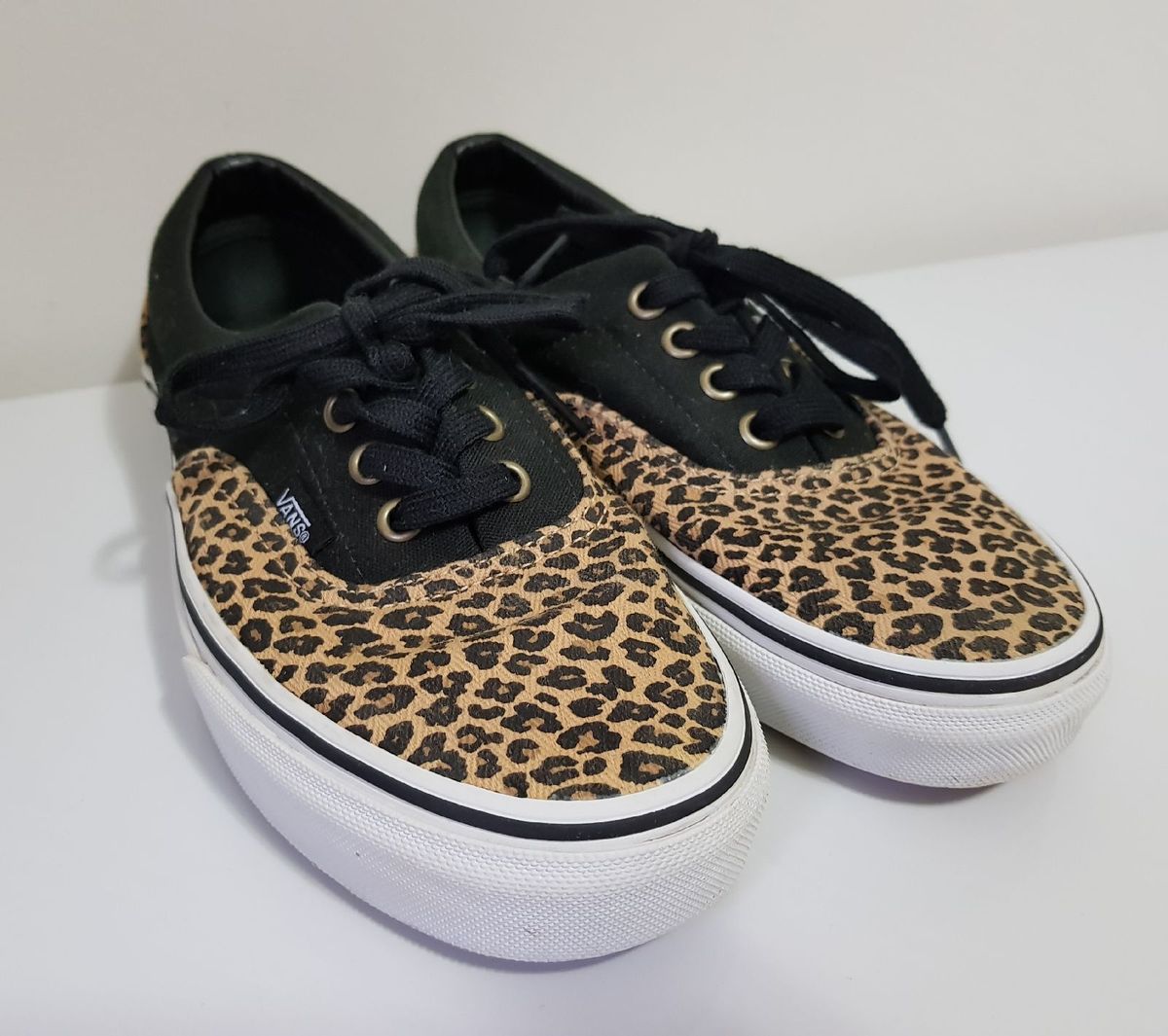 vans onça feminino