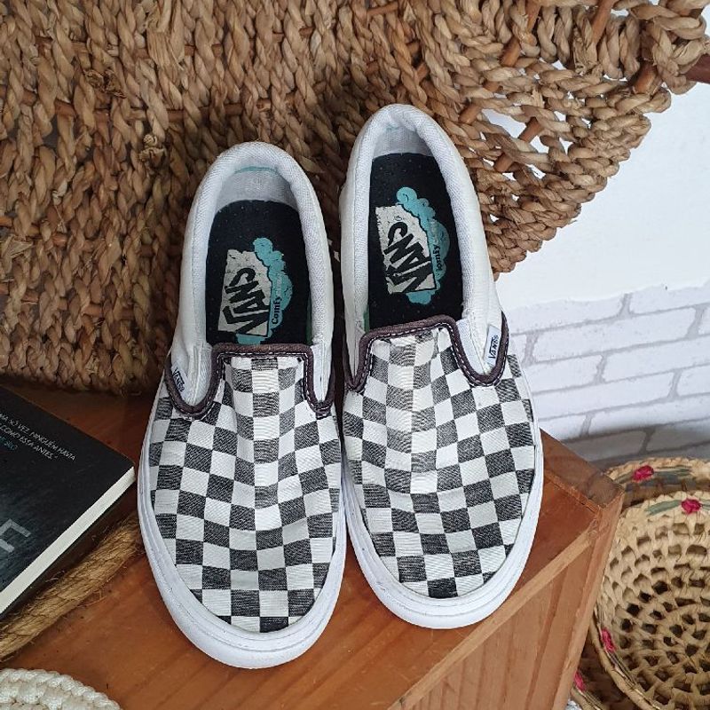 Vans slip on clearance quadriculado preto e branco