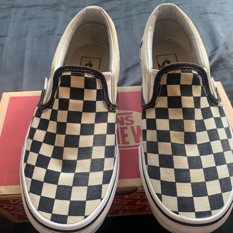 Tenis vans xadrez preto best sale e branco