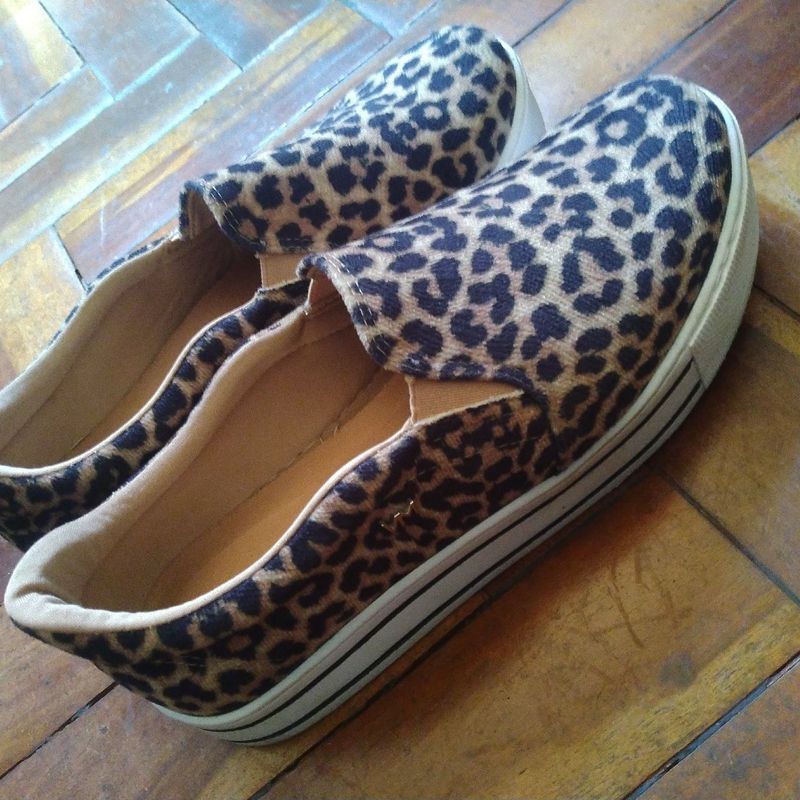 Slip on store via marte oncinha