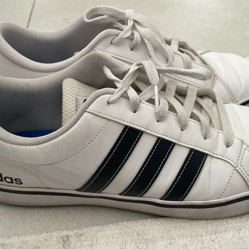 Tenis adidas masculino couro 2024 branco