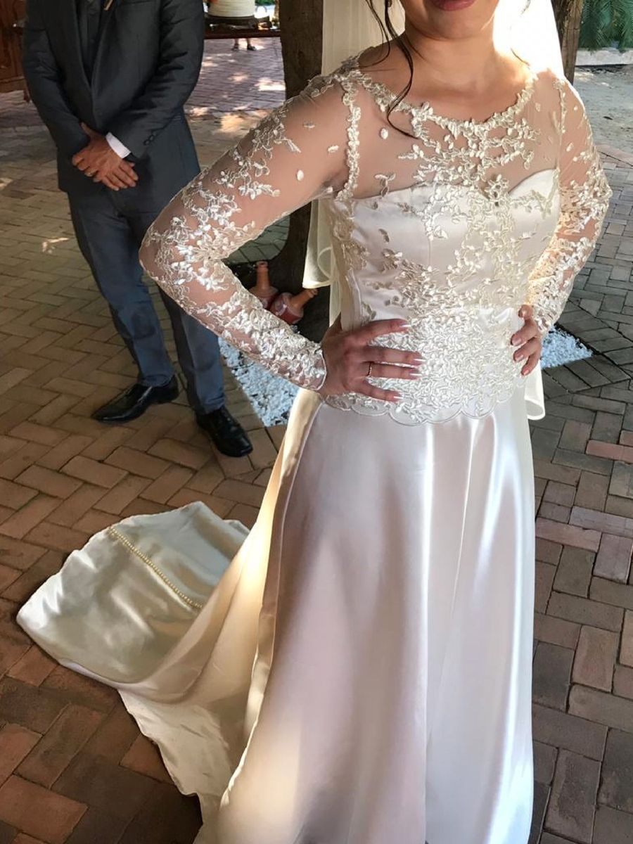 vestido de noiva com manga longa de tule